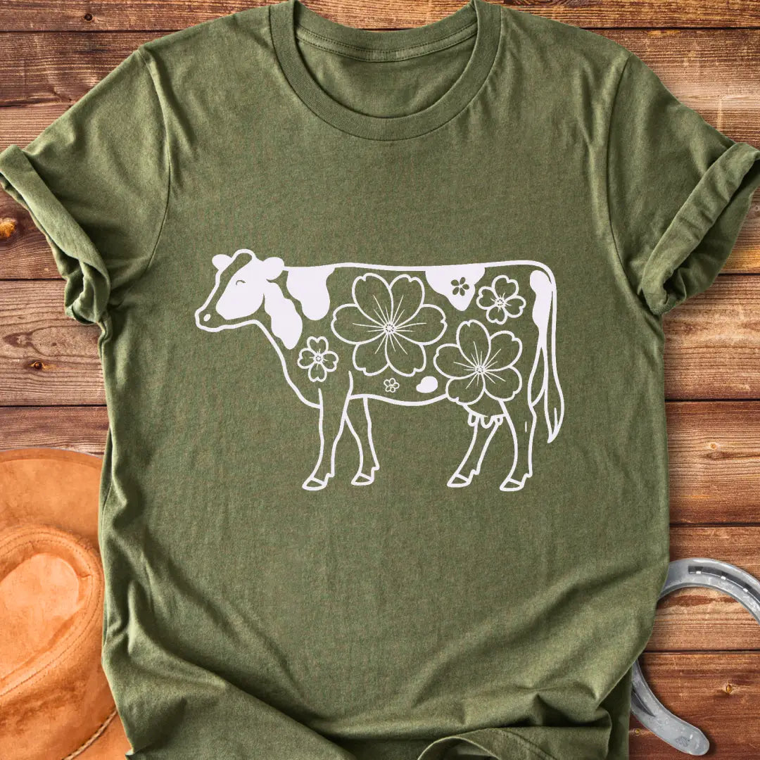 Magnolia Holstein T-Shirt featuring a Holstein cow silhouette with floral design