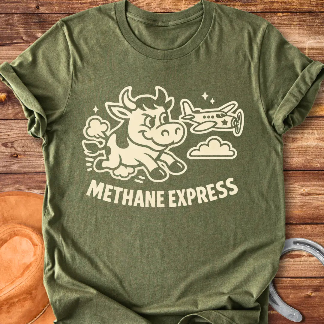 Cartoon cow running alongside airplane on black t-shirt, with the words Methane Express