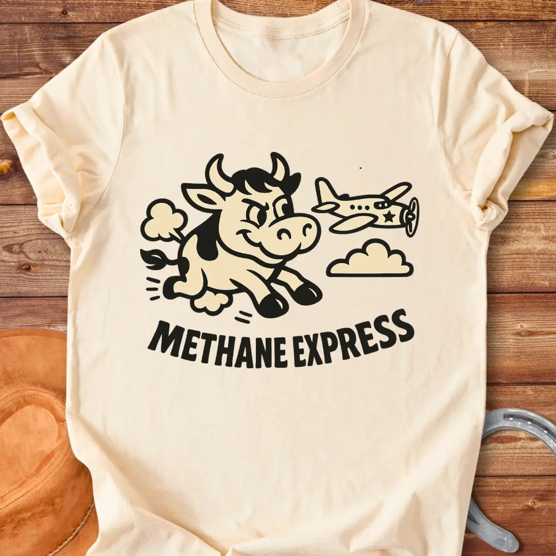 Cartoon cow running alongside airplane on black t-shirt, with the words Methane Express