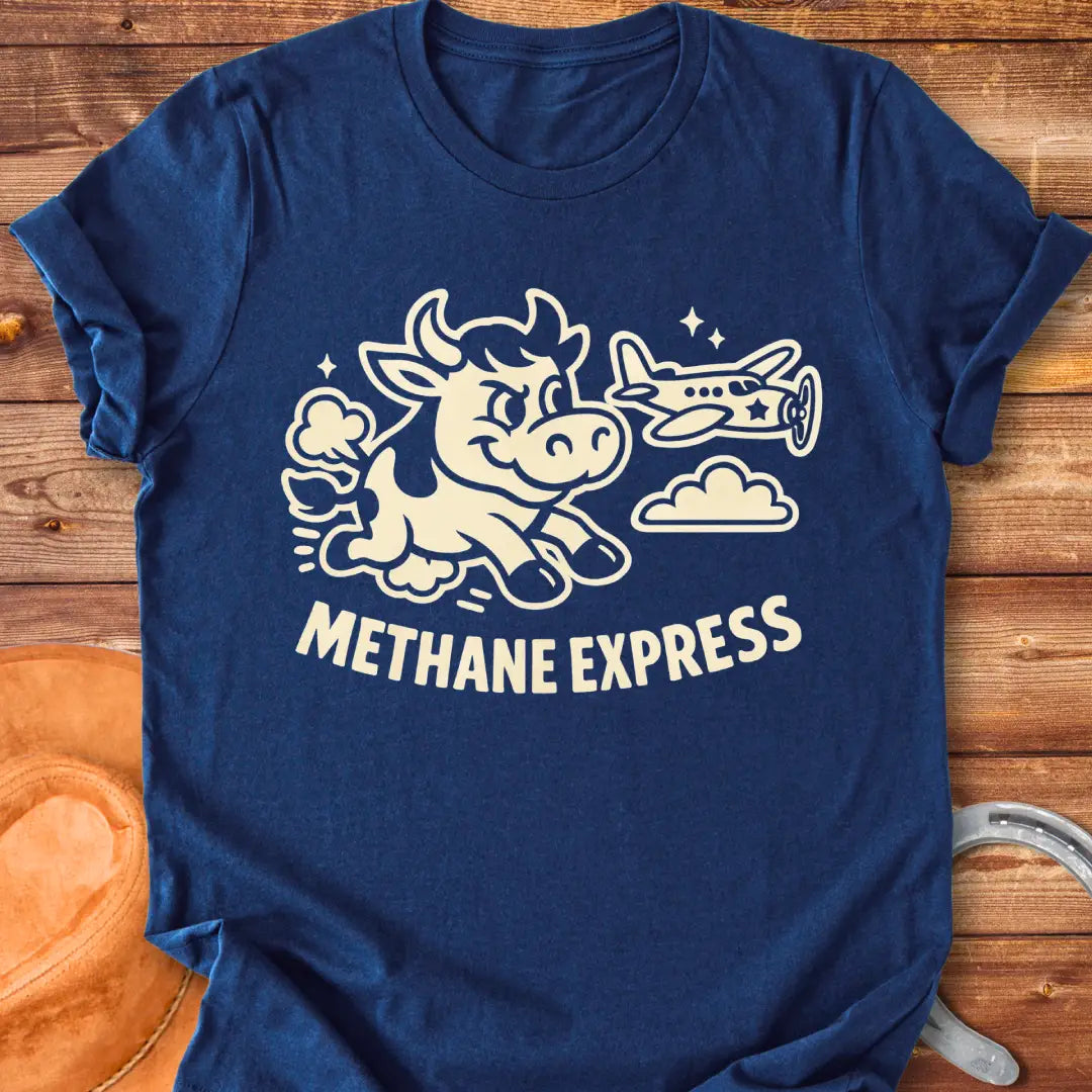 Cartoon cow running alongside airplane on black t-shirt, with the words Methane Express