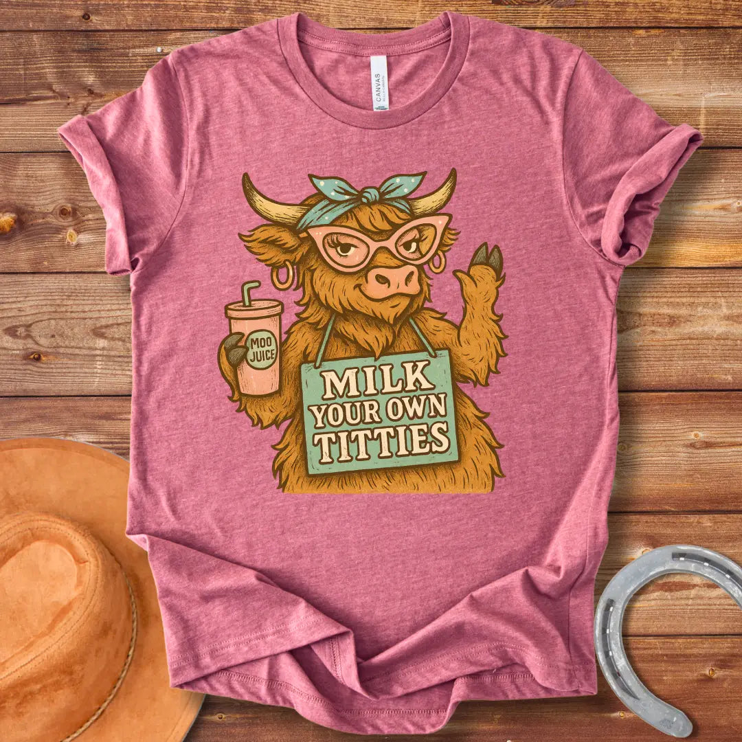 A stylish Highland cow wearing pink glasses and a headscarf holds a 'Moo Juice' drink and a sign that says 'Milk Your Own Titties'.