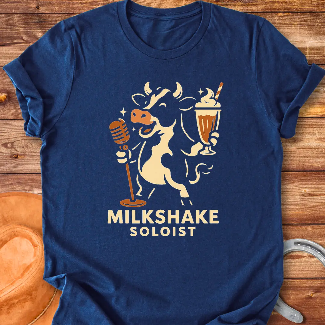 Milkshake Soloist T-Shirt featuring a cartoon cow holding a microphone and a milkshake with stars