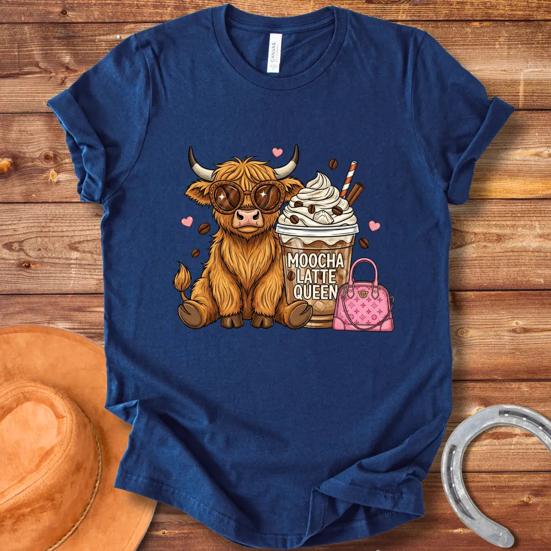 A cartoon image of a cute Highland cow wearing sunglasses, sitting next to a mocha latte and a pink purse that says 'Moocha Latte Queen' on it.