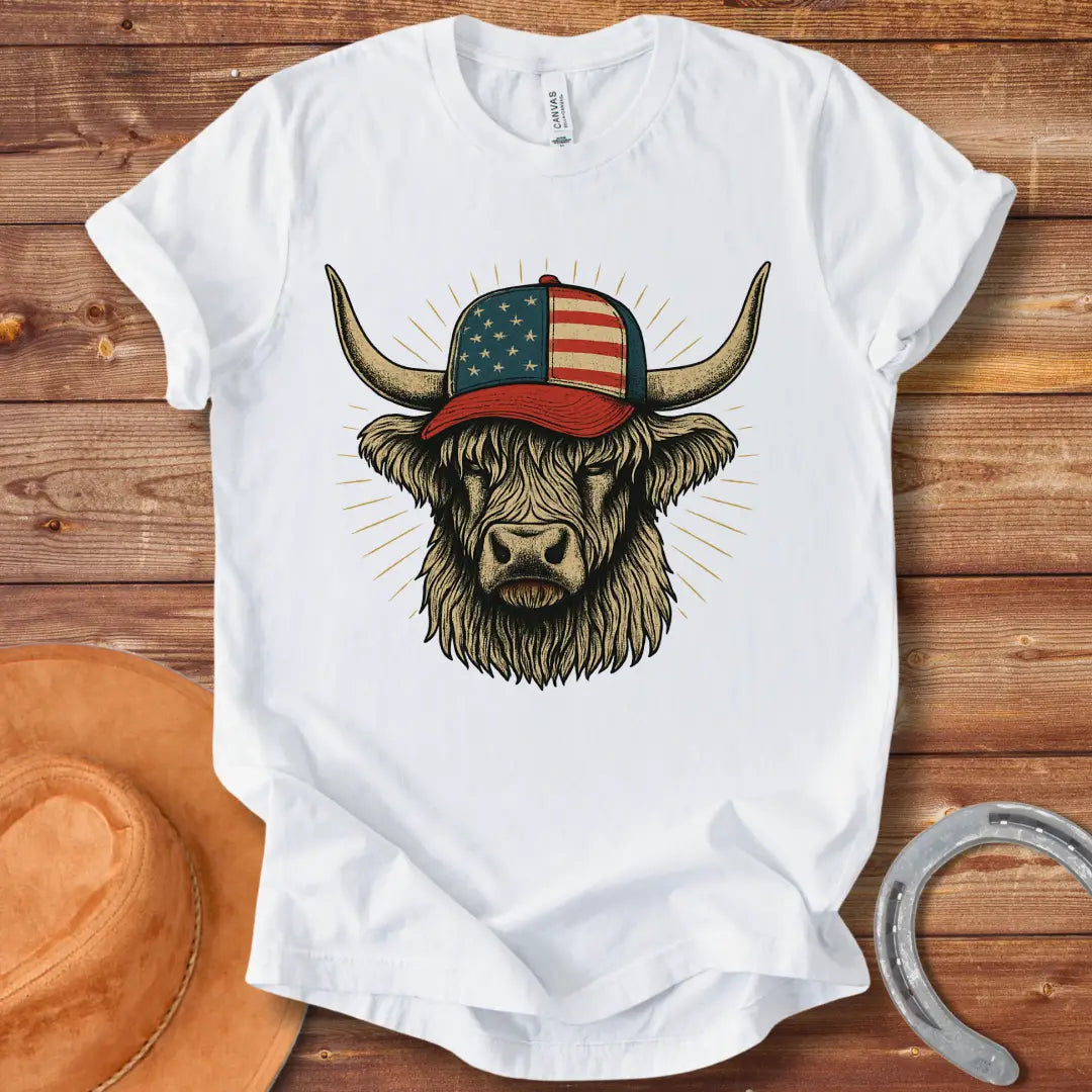 Illustration of a Highland cow wearing an American flag baseball cap, with sun rays emanating from behind the cow's head.
