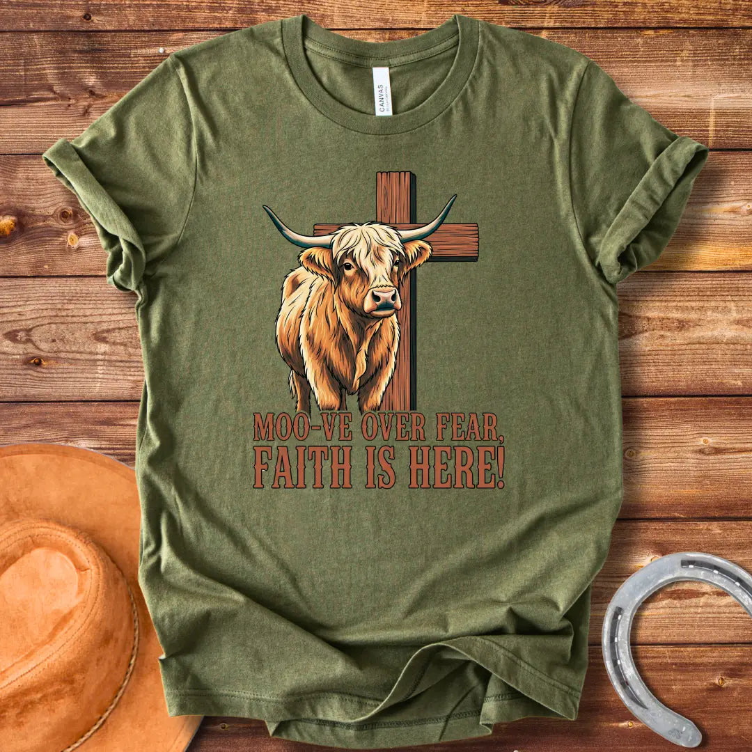 Cow standing in front of a wooden cross with the text 'Moo-ve Over Fear, Faith Is Here!'