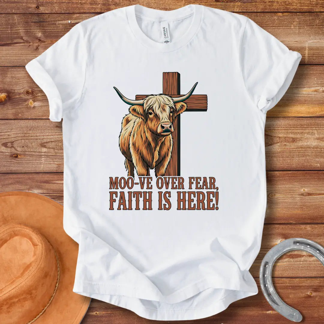 Cow standing in front of a wooden cross with the text 'Moo-ve Over Fear, Faith Is Here!'