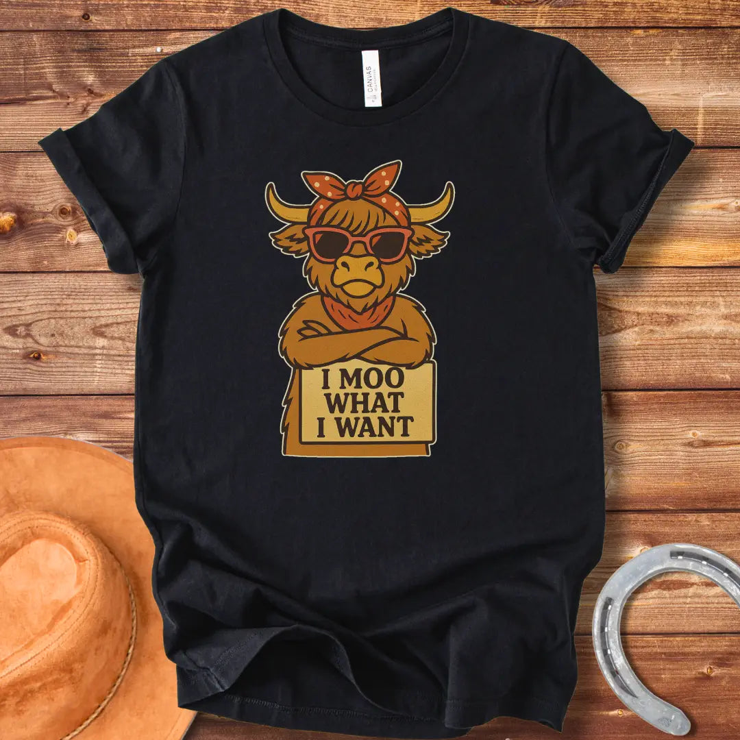 Cool cow with sunglasses and a bandana holding a sign that says 'I Moo What I Want'