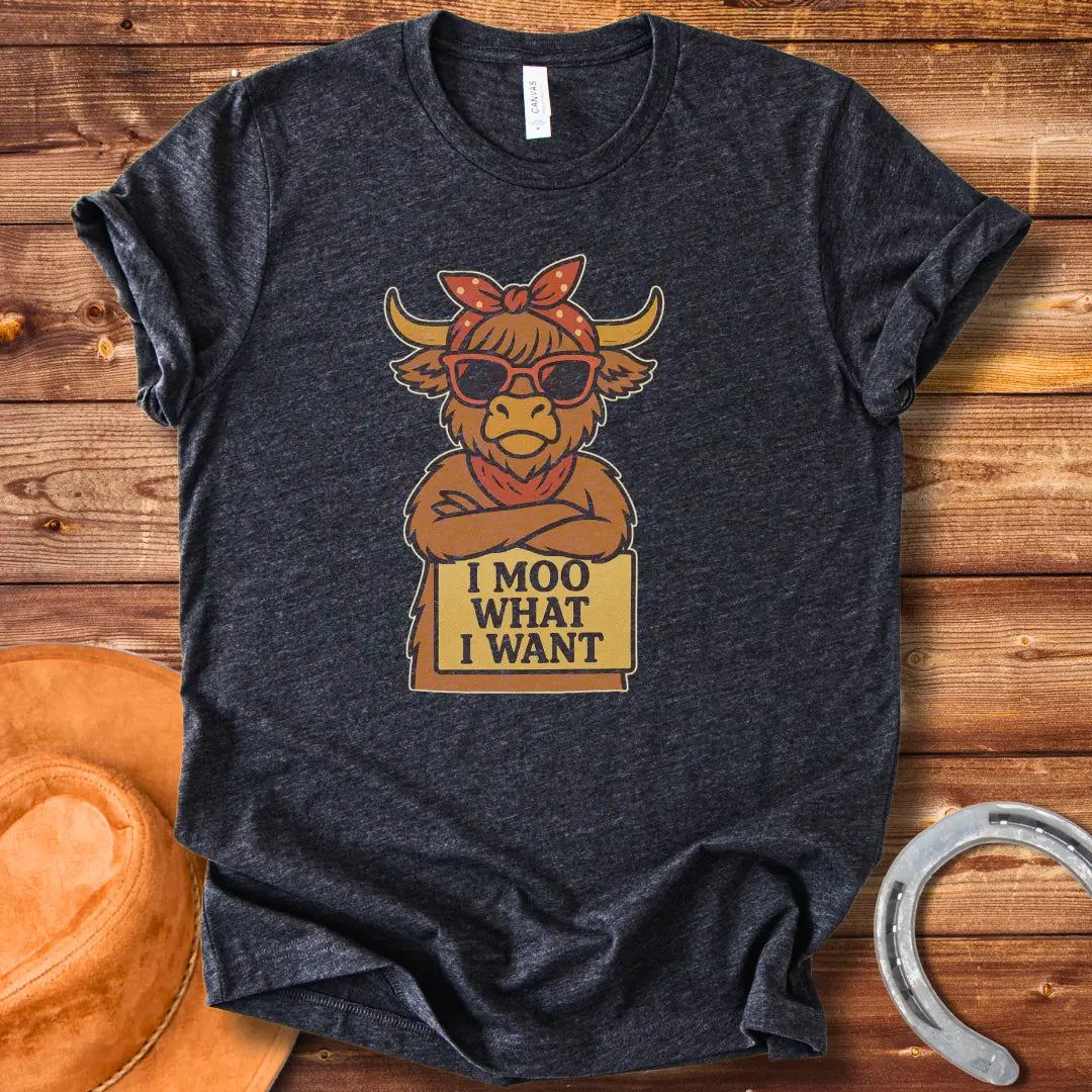 Cool cow with sunglasses and a bandana holding a sign that says 'I Moo What I Want'