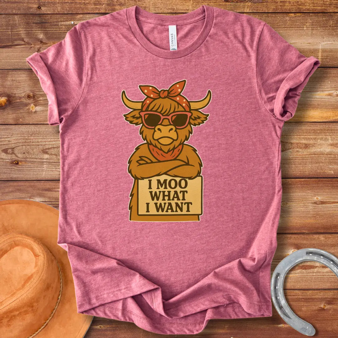Cool cow with sunglasses and a bandana holding a sign that says 'I Moo What I Want'