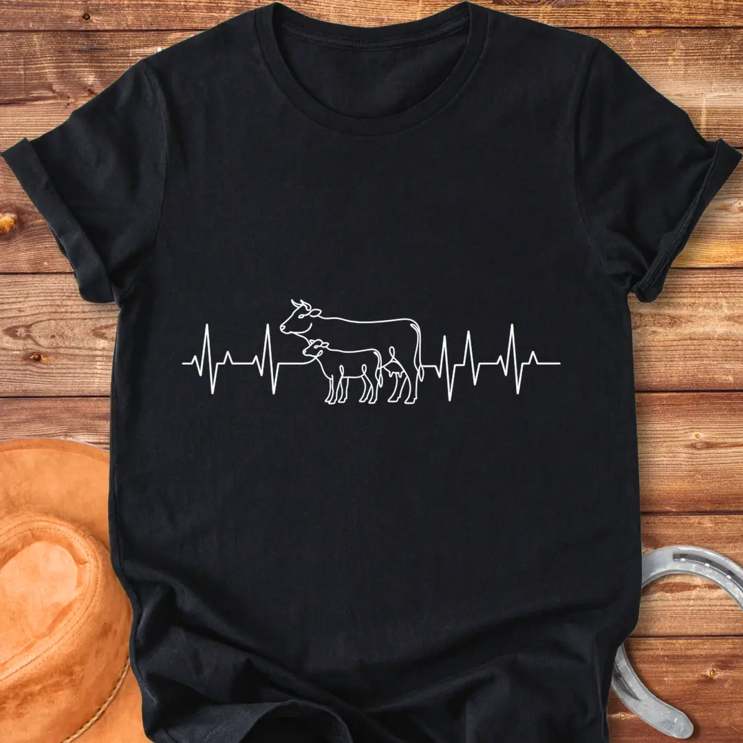 Pasture Heartbeat T-Shirt design featuring a cow and calf within a heartbeat graphic.