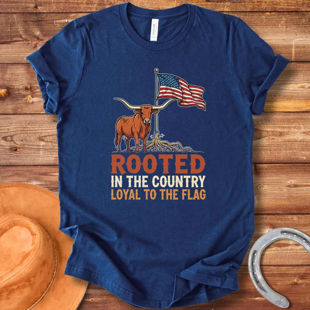 Rooted in the Country T-Shirt featuring a longhorn with roots and the American flag, representing country pride.