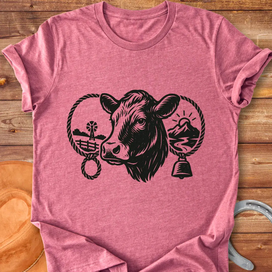 Black and white sketch of a cow head with farm elements, a rope ring and a bell, representing a serene farm life.