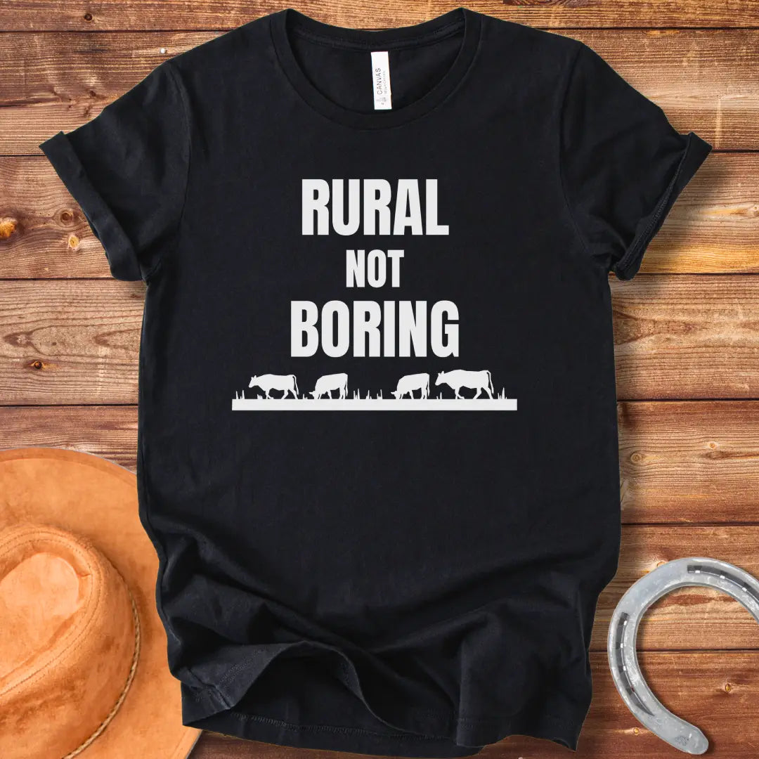Black t-shirt with the text 'Rural Not Boring' printed in white, suitable for cow lovers and country fans.