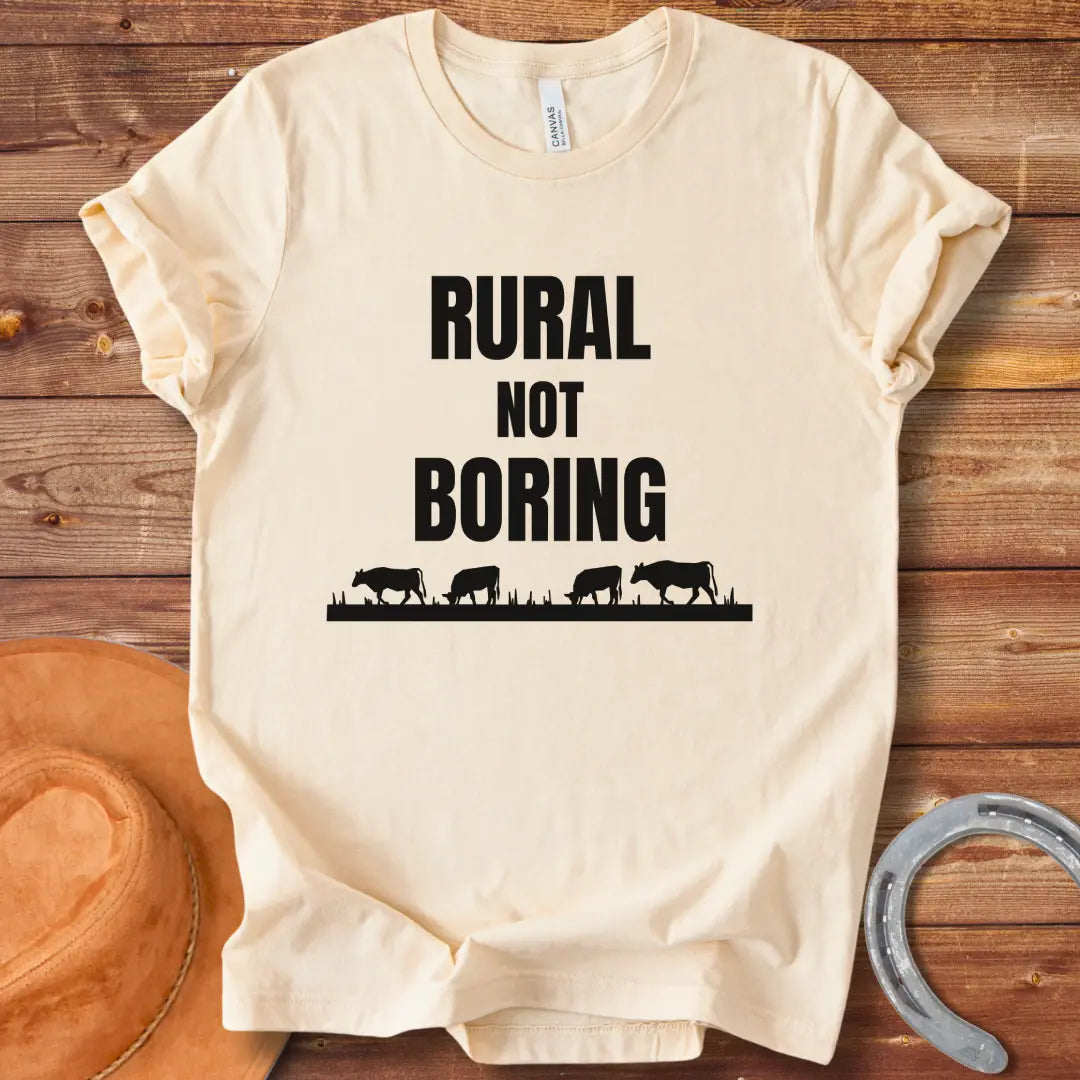 Black t-shirt with the text 'Rural Not Boring' printed in white, suitable for cow lovers and country fans.