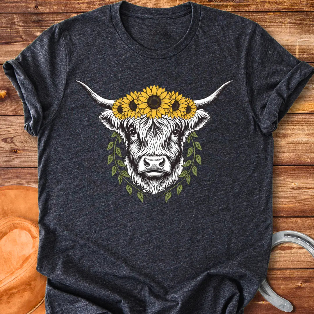 Rustic illustration of a Highland cow wearing a sunflower crown and leafy wreath, perfect for cow lovers.