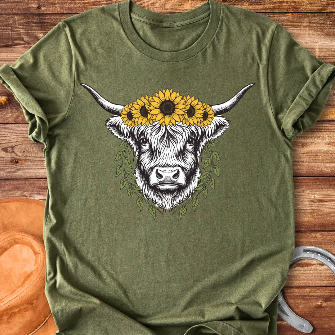 Rustic illustration of a Highland cow wearing a sunflower crown and leafy wreath, perfect for cow lovers.