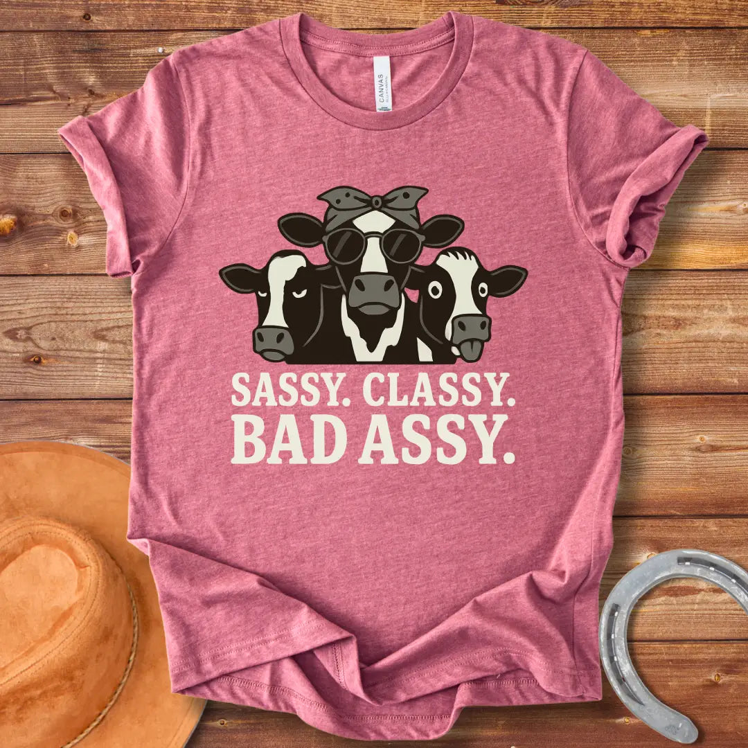 Illustration of three sassy cows wearing sunglasses and bandanas with the words 'Sassy Classy Bad Assy' below.