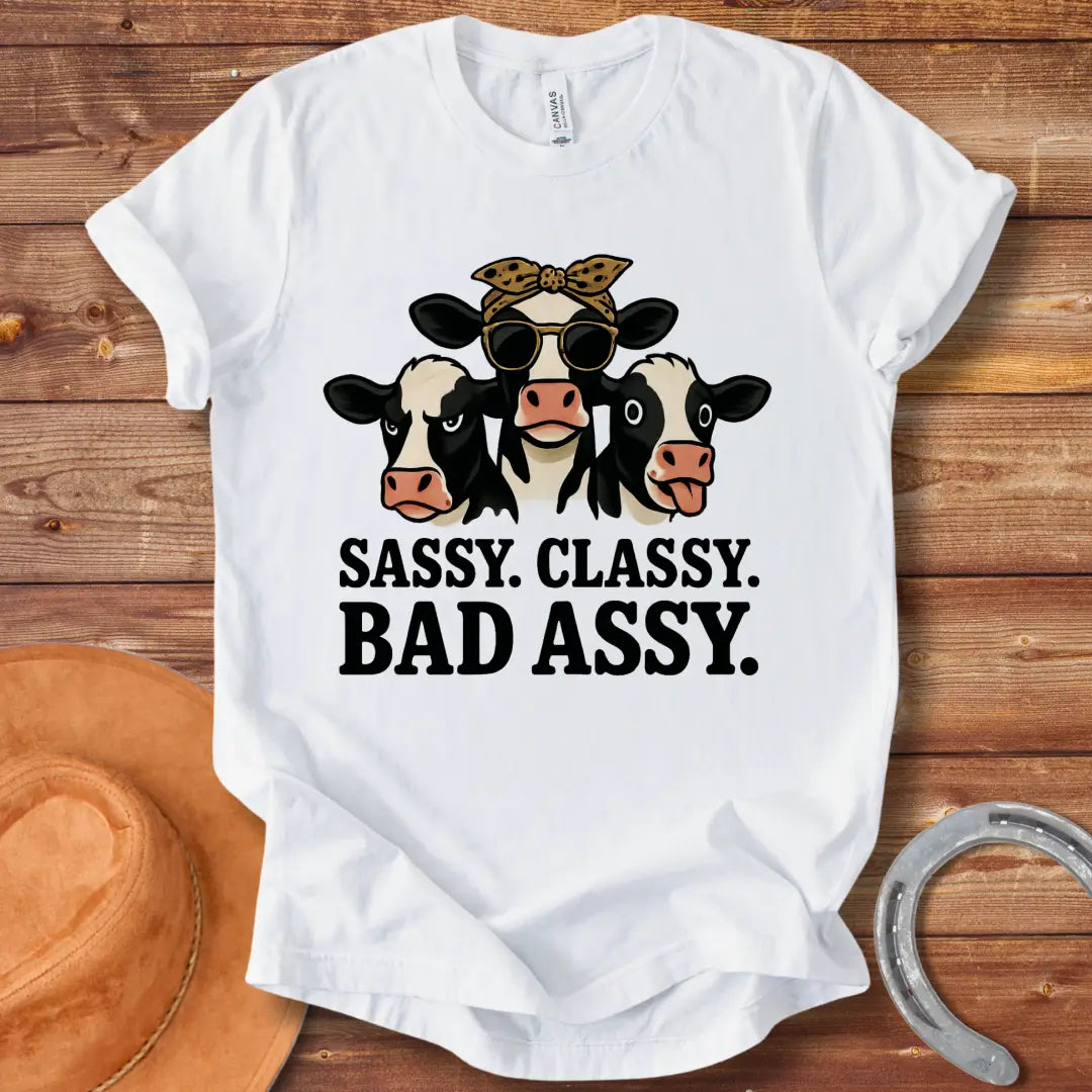 Illustration of three sassy cows wearing sunglasses and bandanas with the words 'Sassy Classy Bad Assy' below.