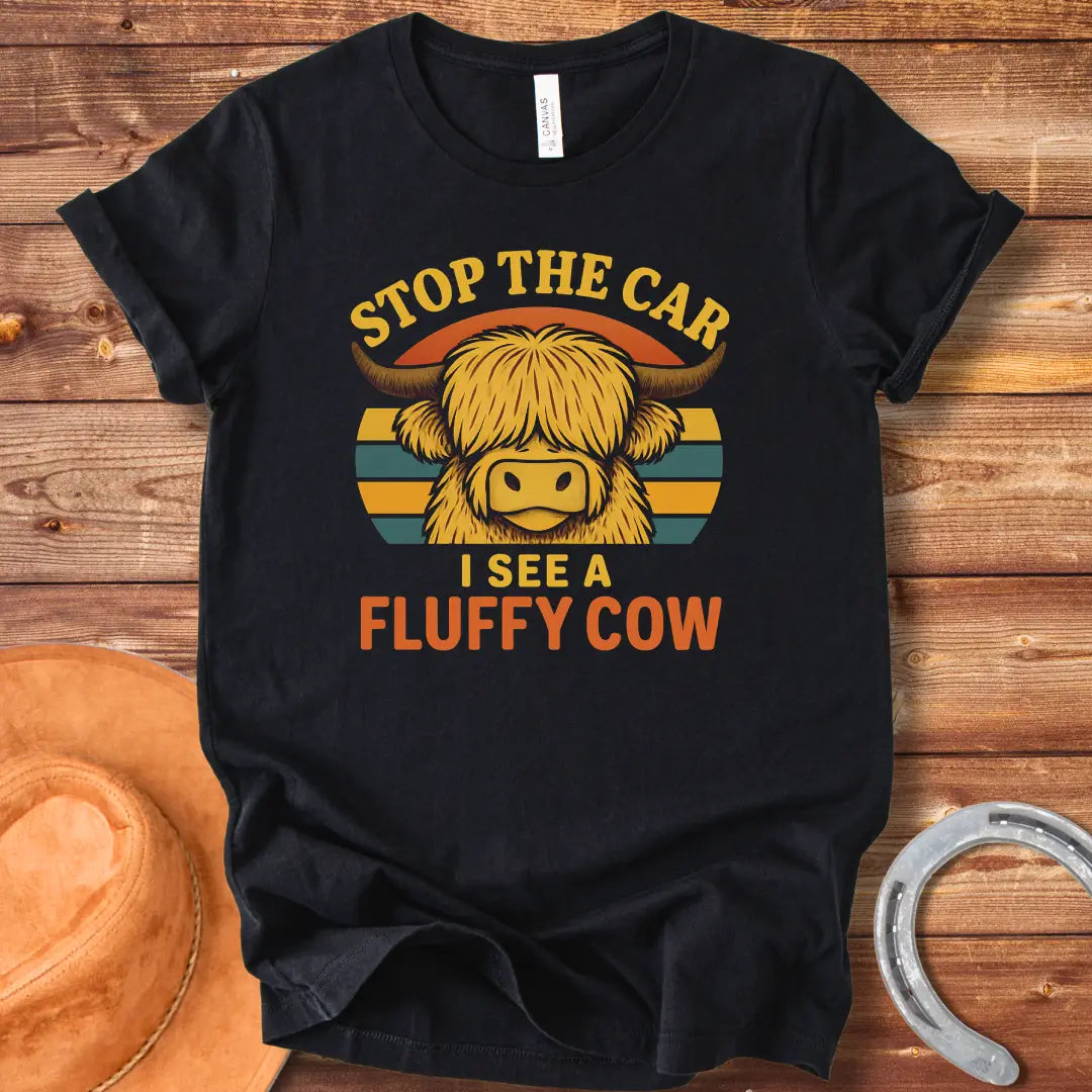 Retro t-shirt with a fluffy highland cow, the text reads 'Stop the Car I See a Fluffy Cow'