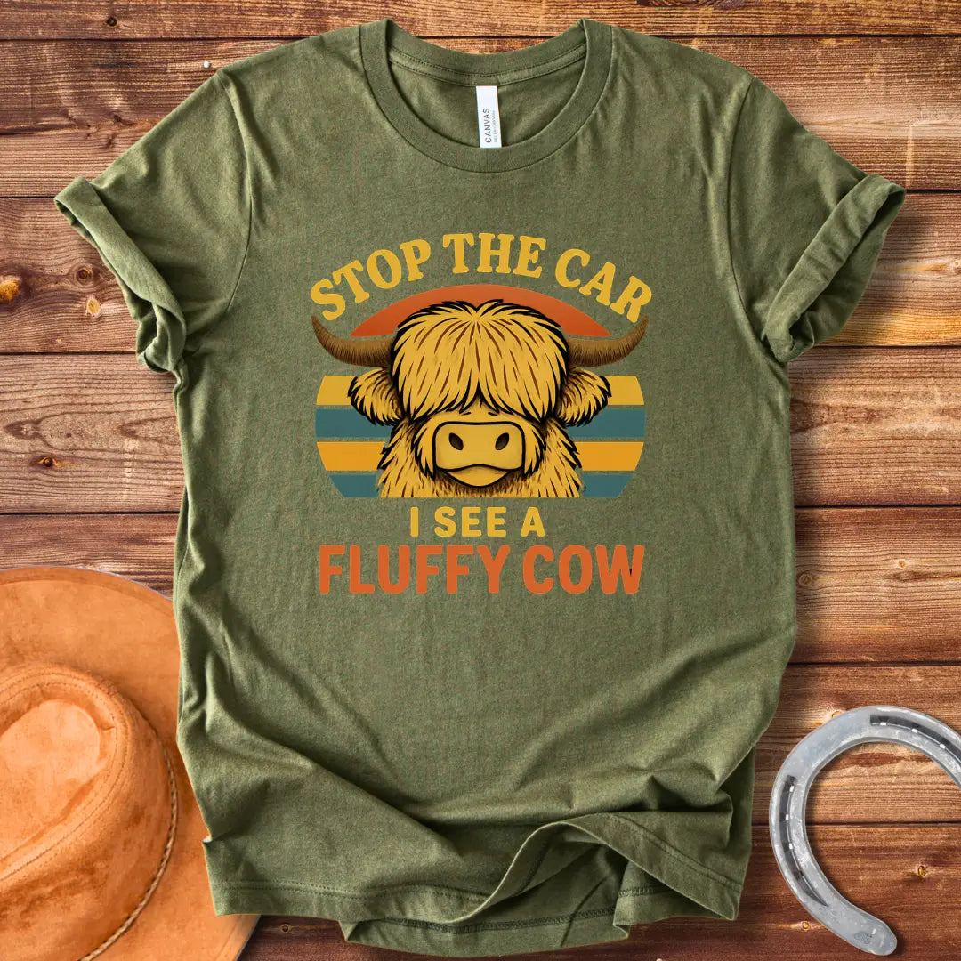 Retro t-shirt with a fluffy highland cow, the text reads 'Stop the Car I See a Fluffy Cow'