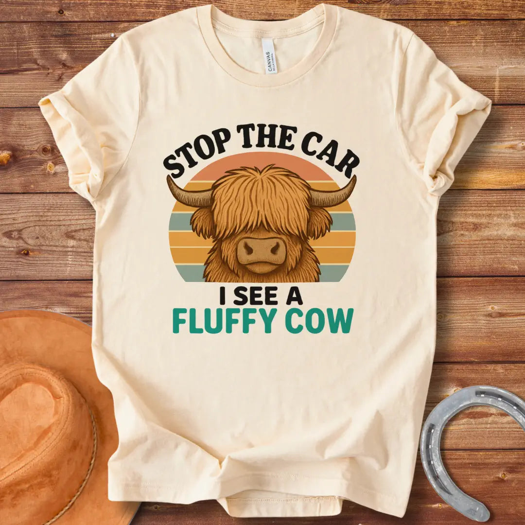 Retro t-shirt with a fluffy highland cow, the text reads 'Stop the Car I See a Fluffy Cow'
