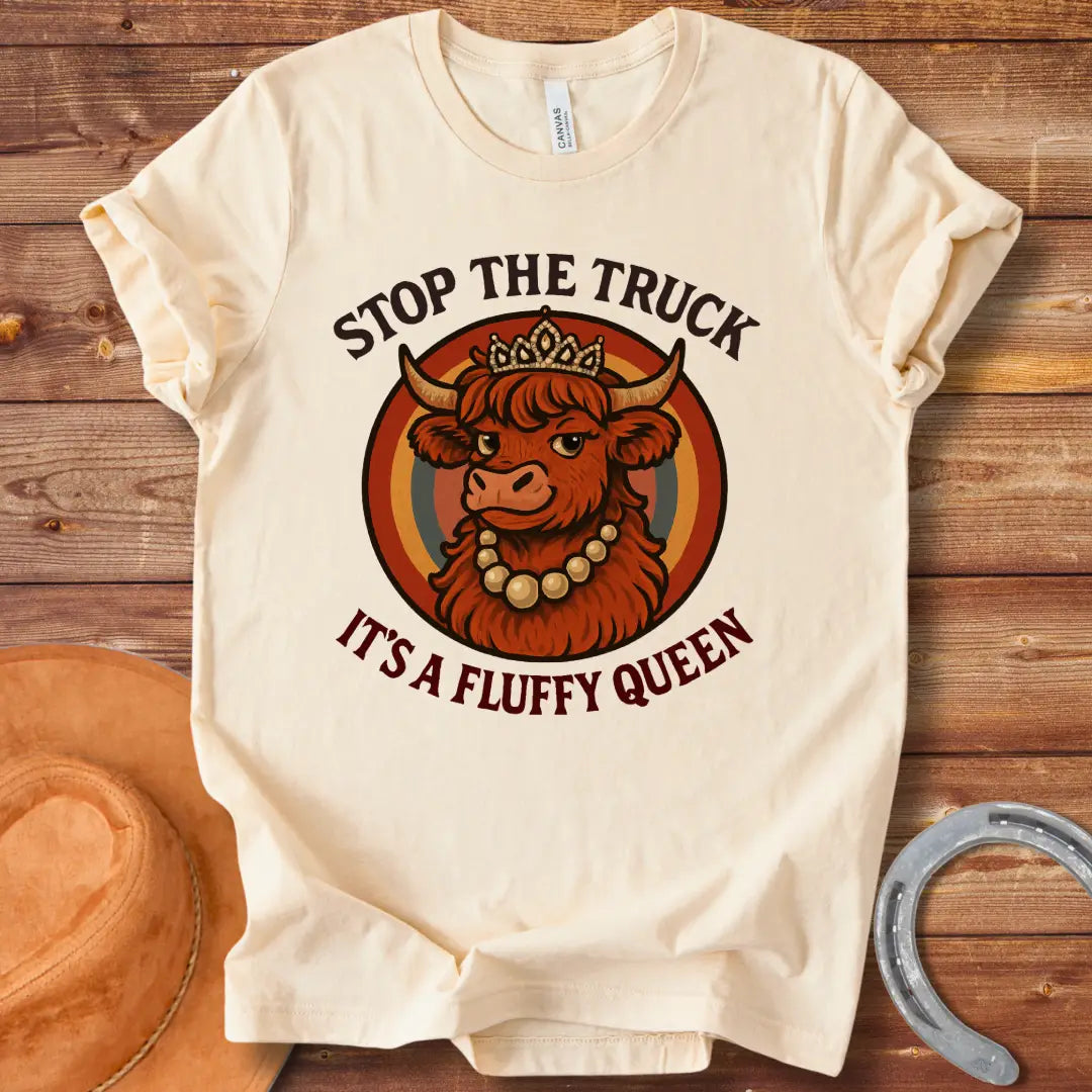 Stop The Truck For Fluffy Queen T-shirt featuring a fluffy Highland cow wearing a crown and pearls, set against a retro rainbow background