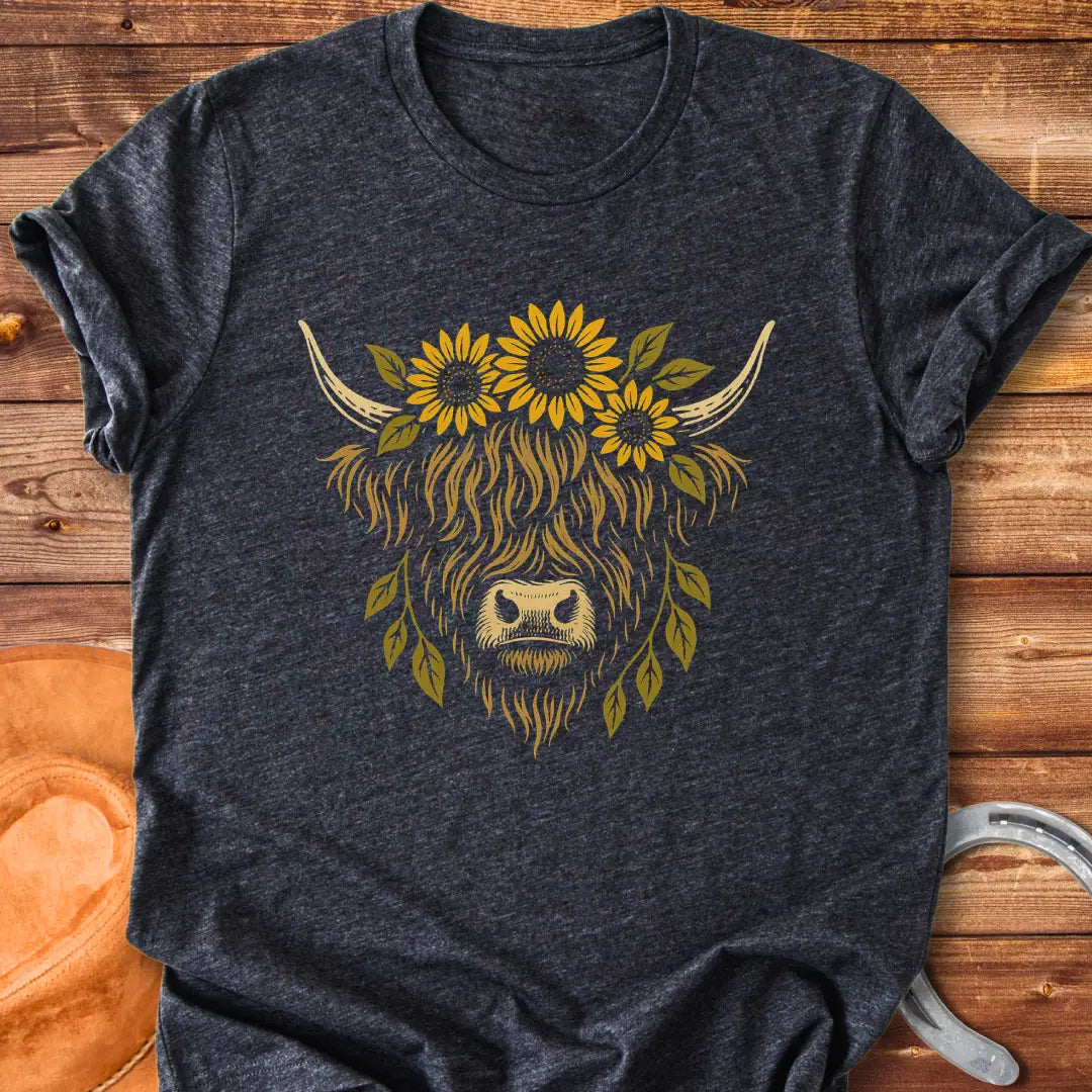 Highland cow wearing a sunflower crown, floral design t-shirt.