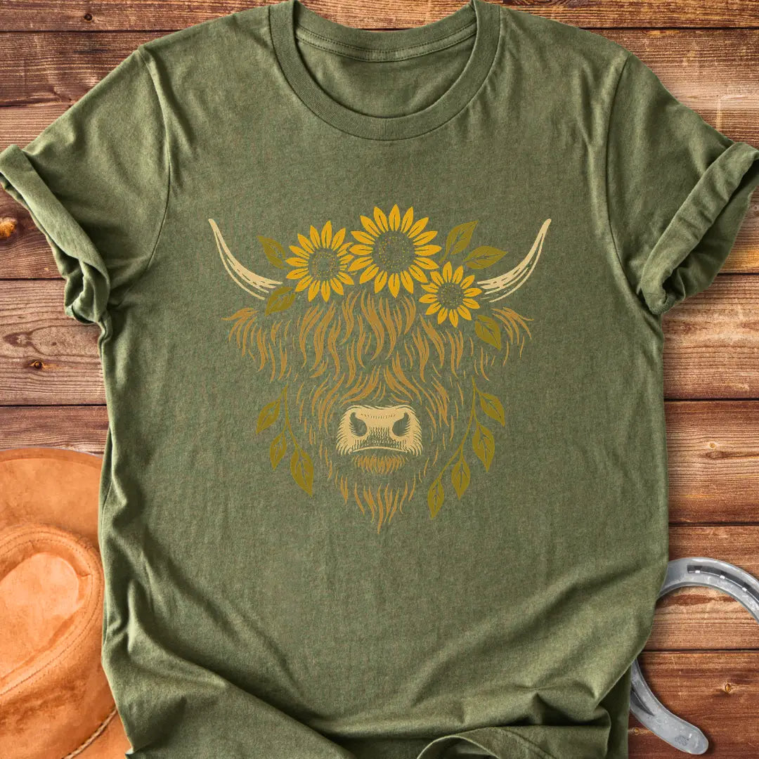 Highland cow wearing a sunflower crown, floral design t-shirt.