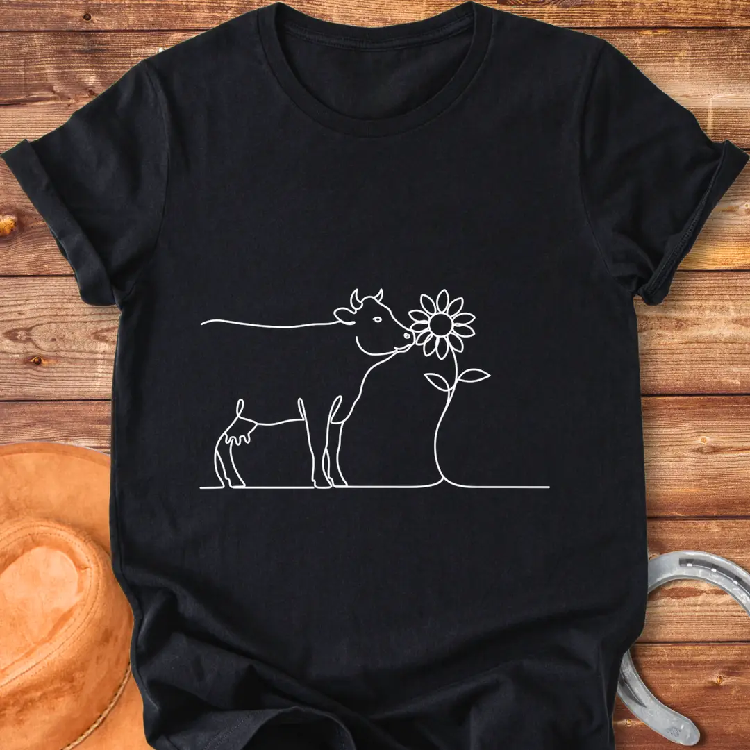 Line art illustration of a cow kissing a sunflower, a Cow Lovers Clothing product