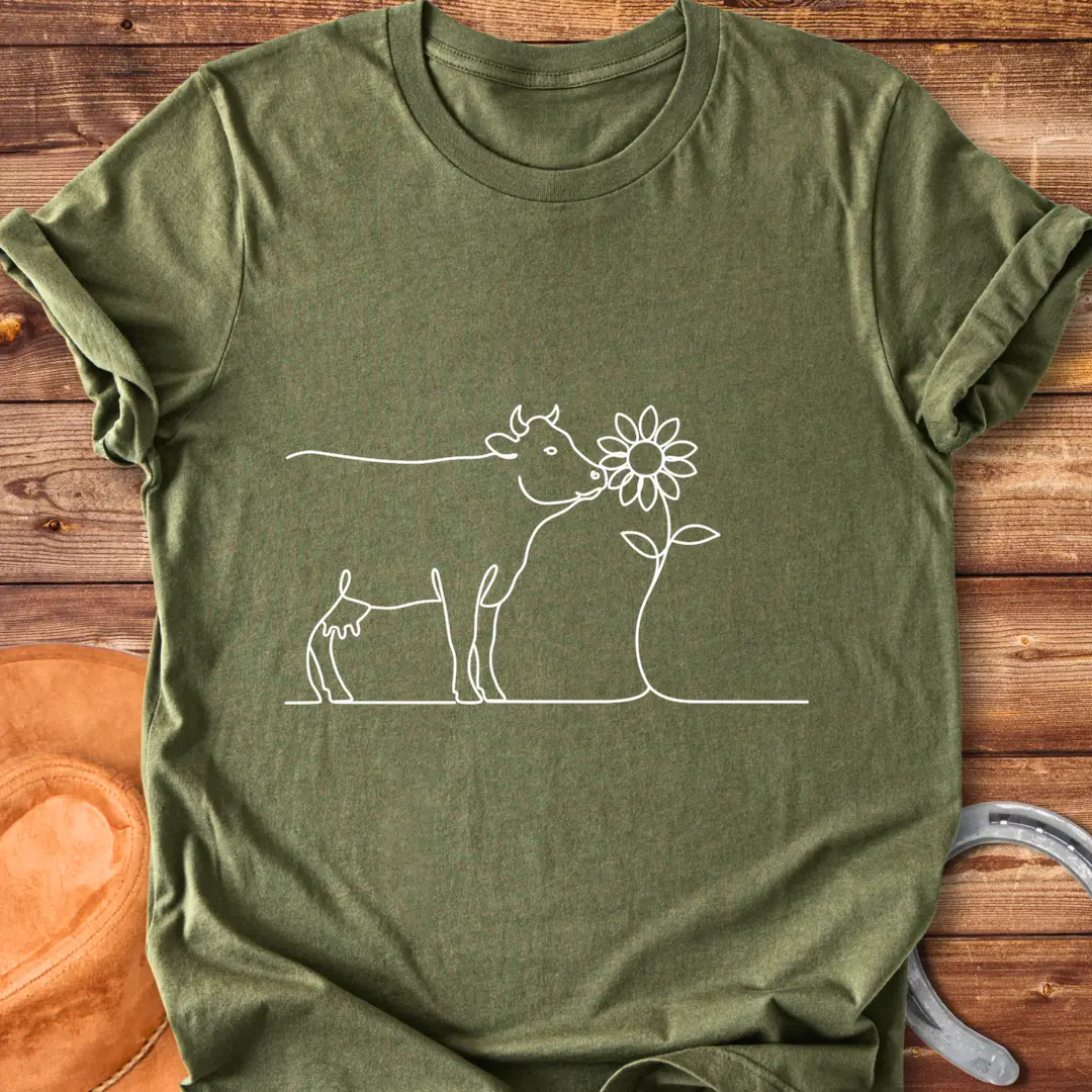 Line art illustration of a cow kissing a sunflower, a Cow Lovers Clothing product