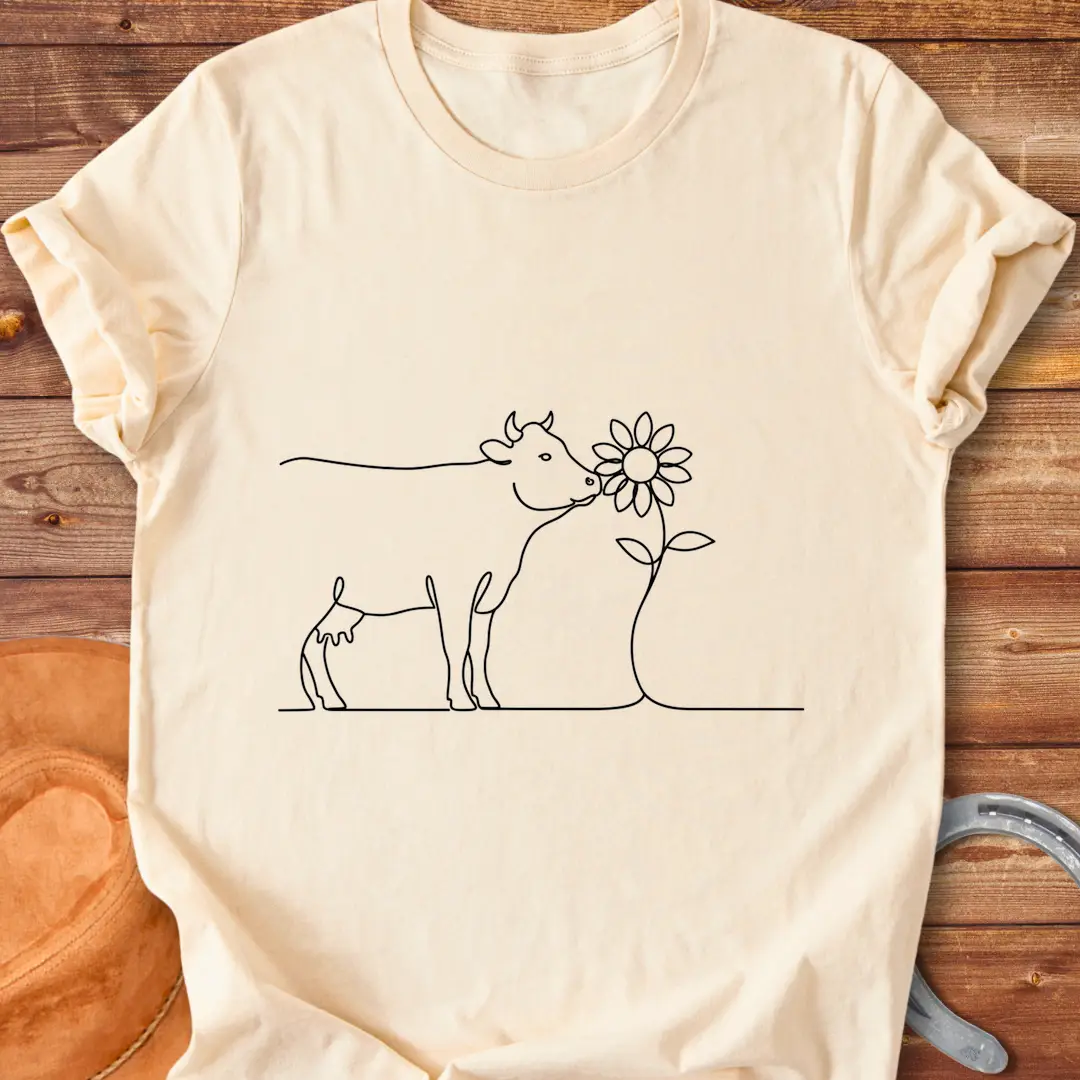 Line art illustration of a cow kissing a sunflower, a Cow Lovers Clothing product