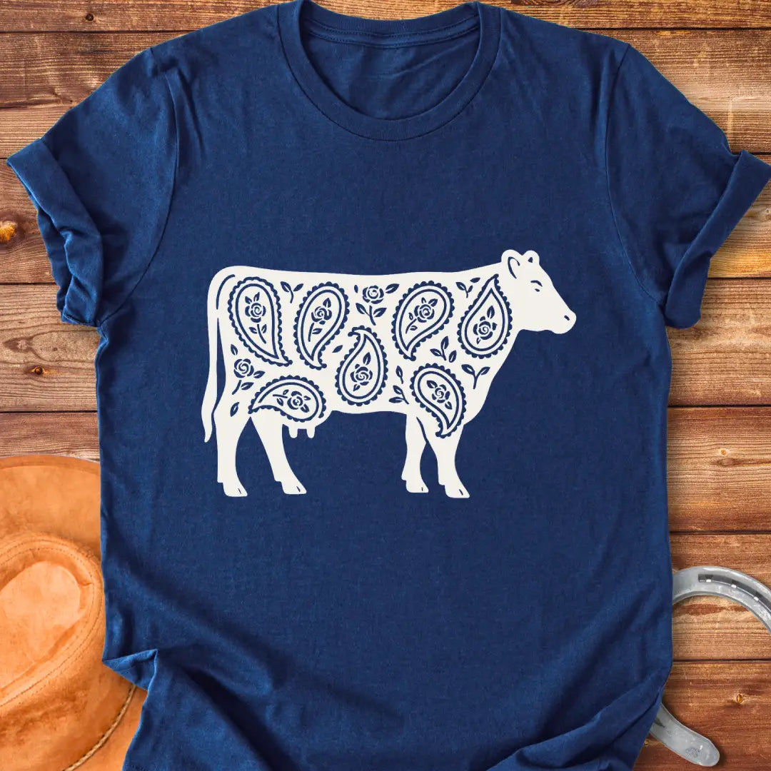 Black cow silhouette with paisley teardrop and rose floral pattern