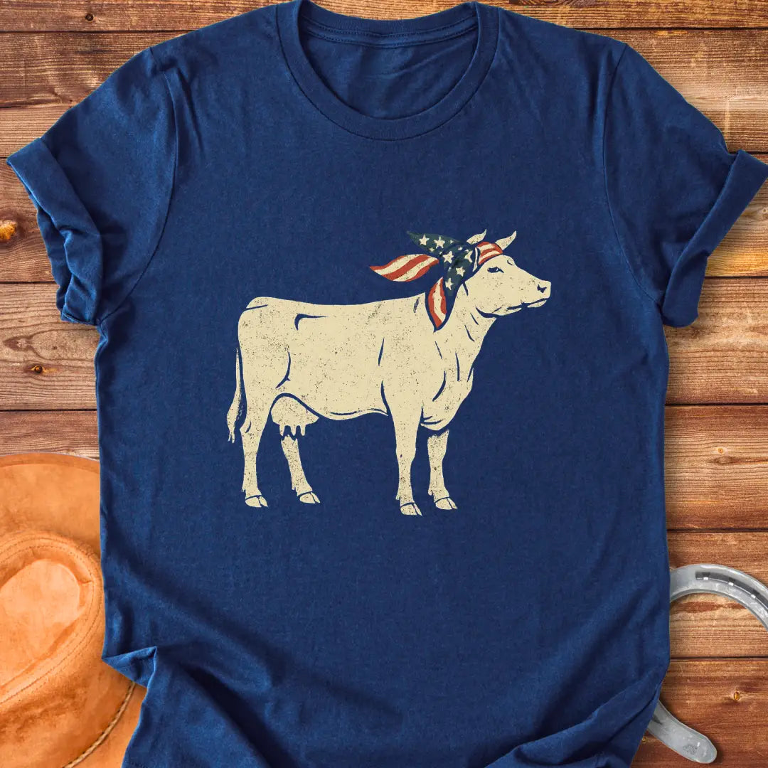 USA Cowgirl T-Shirt featuring a brown cow wearing an American flag bandana, patriotic cow design