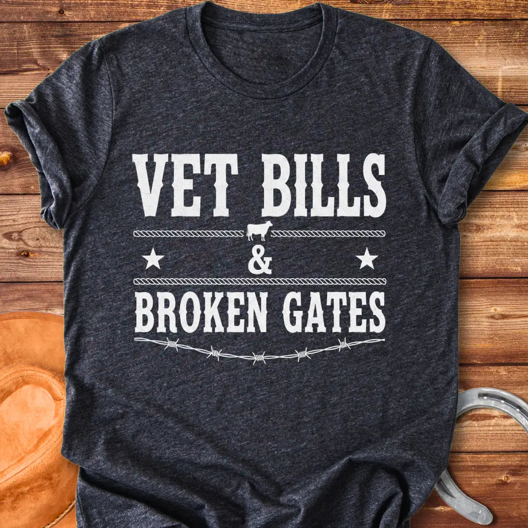 Vet Bills and Broken Gates t-shirt design with a cow silhouette, stars, and barbed wire.