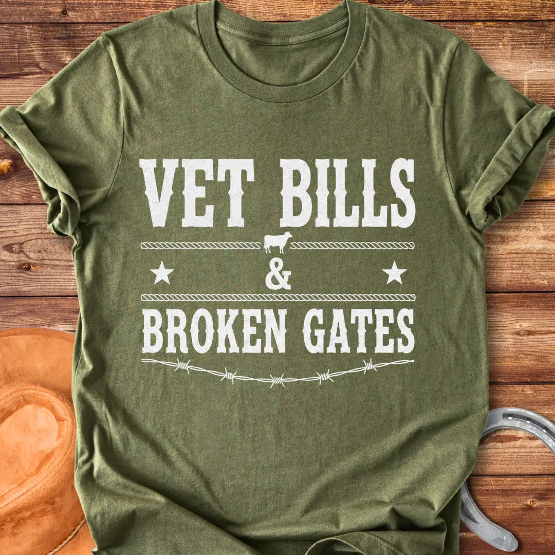 Vet Bills and Broken Gates t-shirt design with a cow silhouette, stars, and barbed wire.