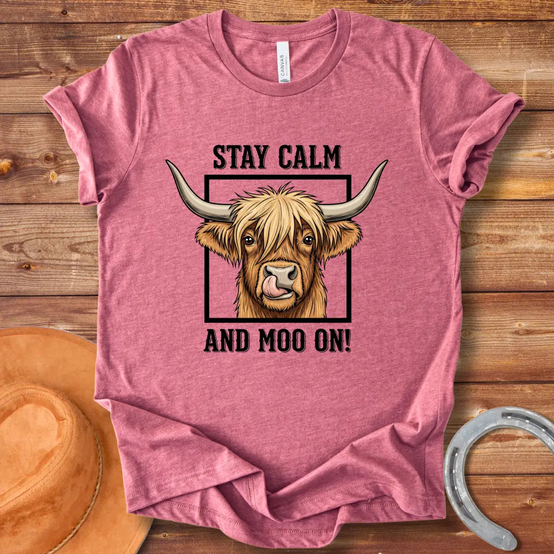 Highland cow graphic t-shirt with the phrase "Stay Calm and Moo On"