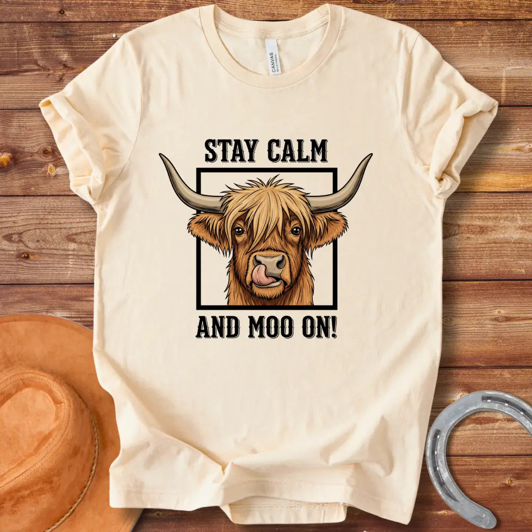 Highland cow graphic t-shirt with the phrase "Stay Calm and Moo On"