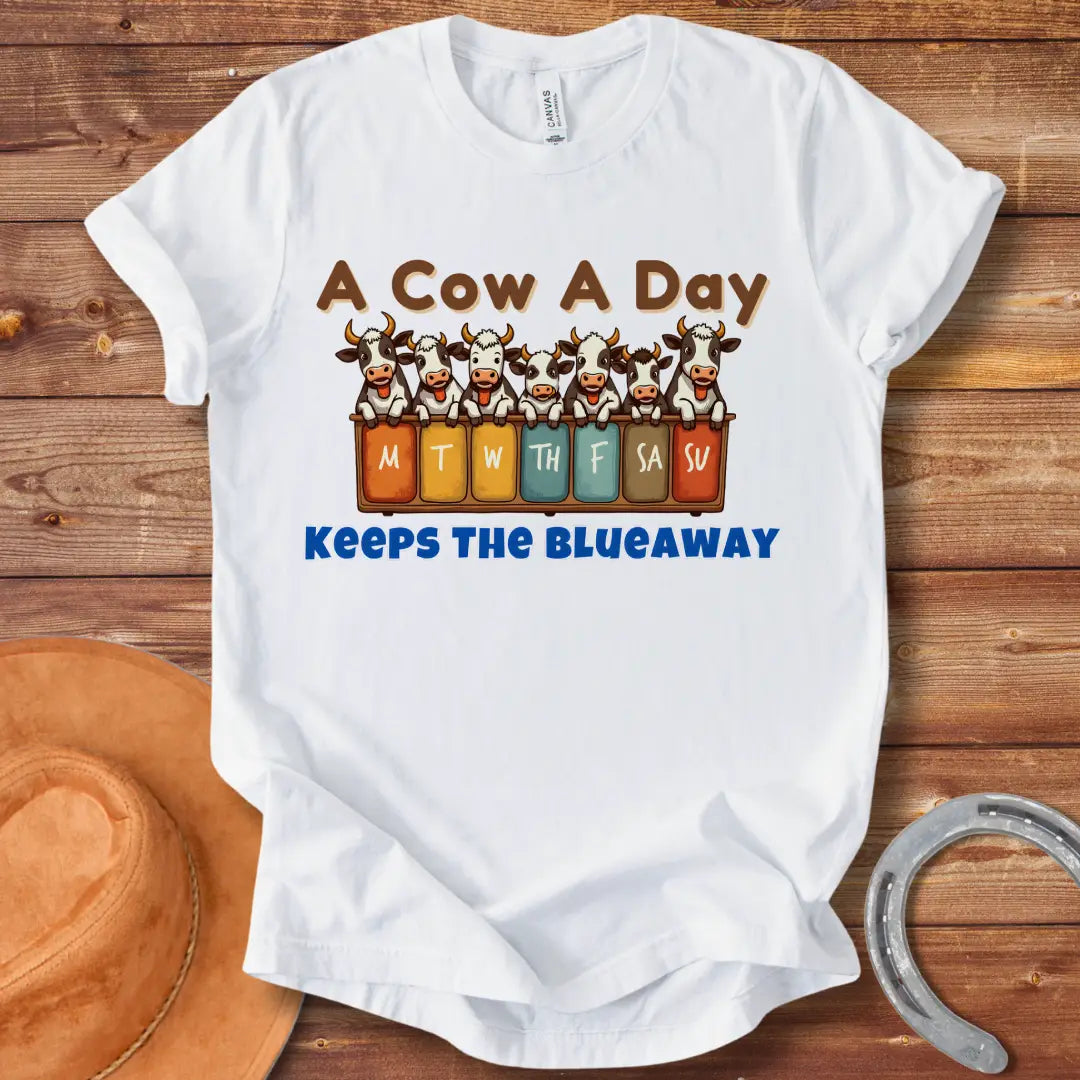 Illustration of seven happy cows each peeking over a box holding days of the week, the text at the bottom saying 'Keeps the Blue Away'.