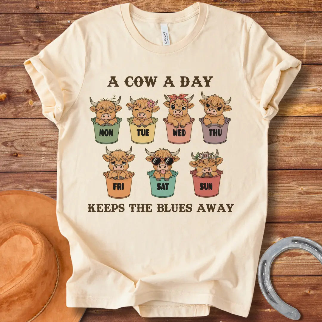 A Cow A Day Vintage T-Shirt featuring cute cow illustrations for each day of the week, designed for cow lovers.