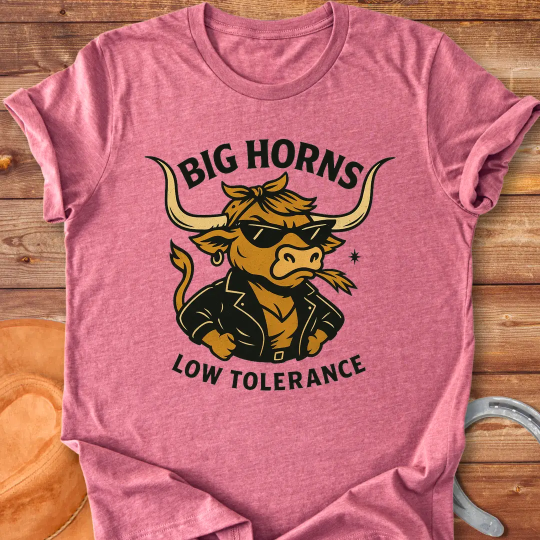 A cool cow wearing sunglasses and a leather jacket, with the words 'Big Horns Low Tolerance'.
