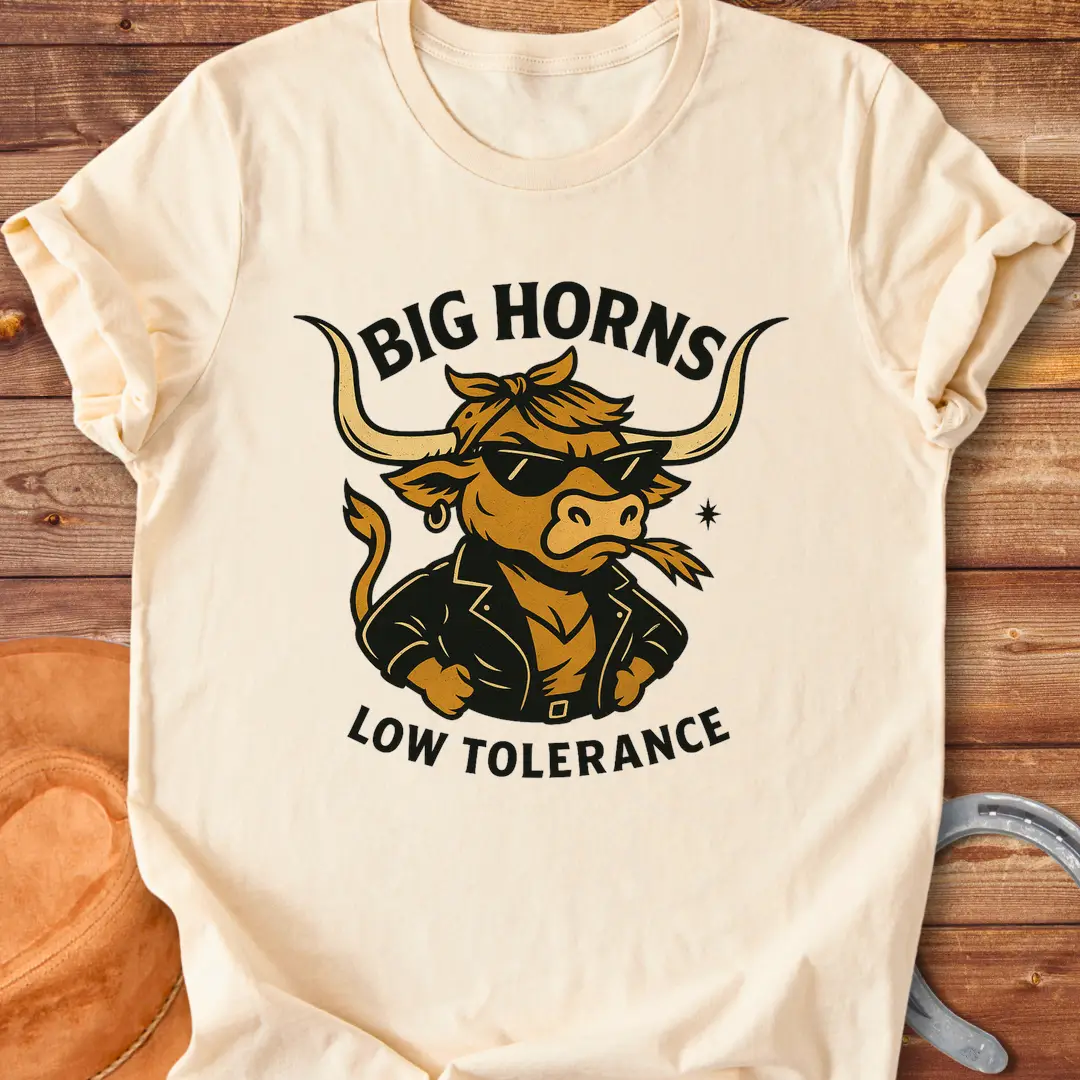 A cool cow wearing sunglasses and a leather jacket, with the words 'Big Horns Low Tolerance'.
