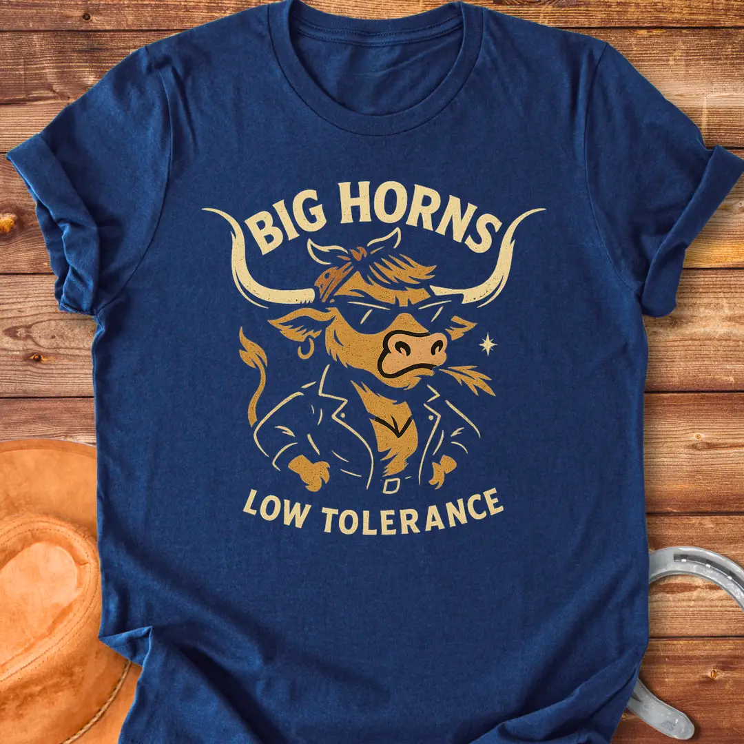 A cool cow wearing sunglasses and a leather jacket, with the words 'Big Horns Low Tolerance'.