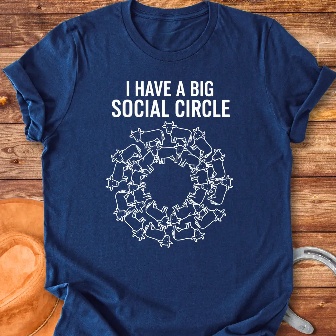 T-shirt with the words 'I have a big social circle' above a circular arrangement of cow illustrations.