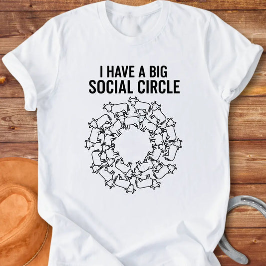 T-shirt with the words 'I have a big social circle' above a circular arrangement of cow illustrations.