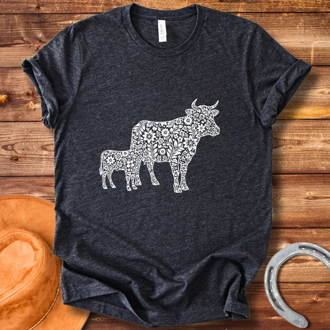 Boho design featuring a mom cow and calf filled with floral patterns.  A beautiful and expressive design to share cow love