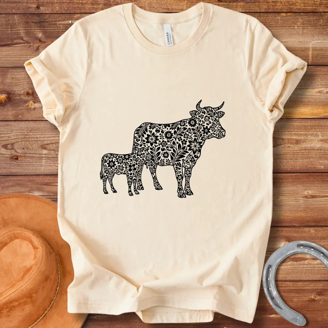 Boho design featuring a mom cow and calf filled with floral patterns.  A beautiful and expressive design to share cow love