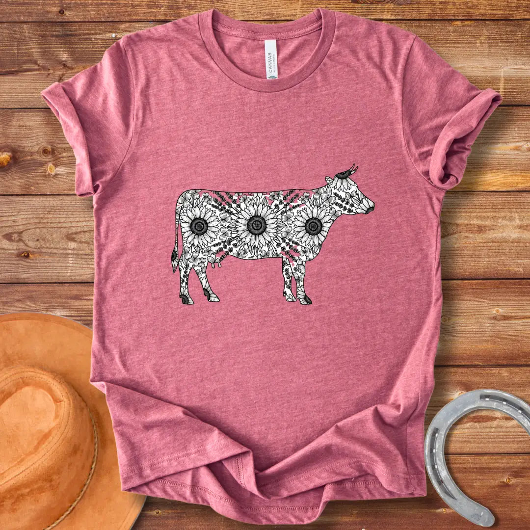 Botanical Cow Sketch T-Shirt featuring a cow silhouette filled with flowers and foliage