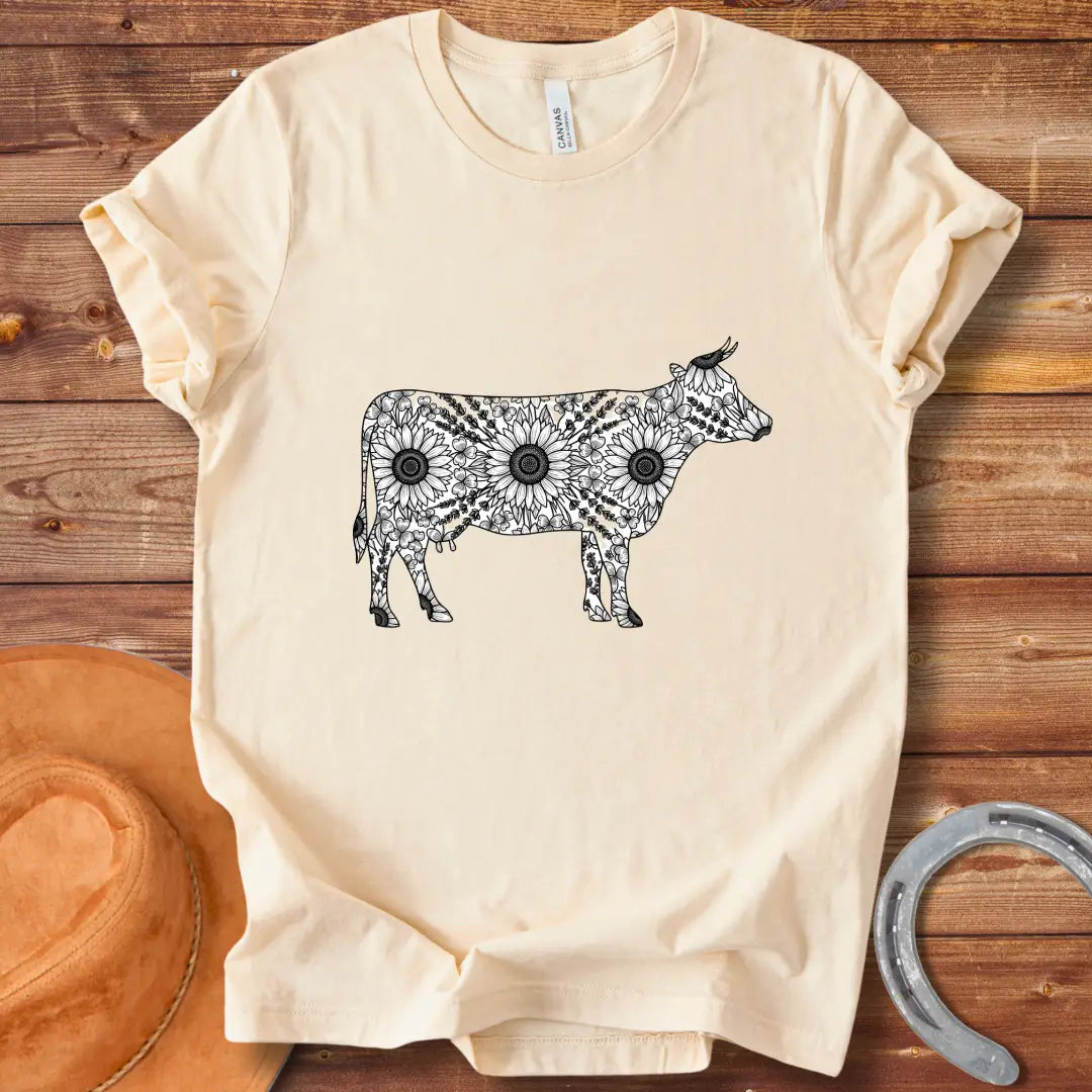 Botanical Cow Sketch T-Shirt featuring a cow silhouette filled with flowers and foliage