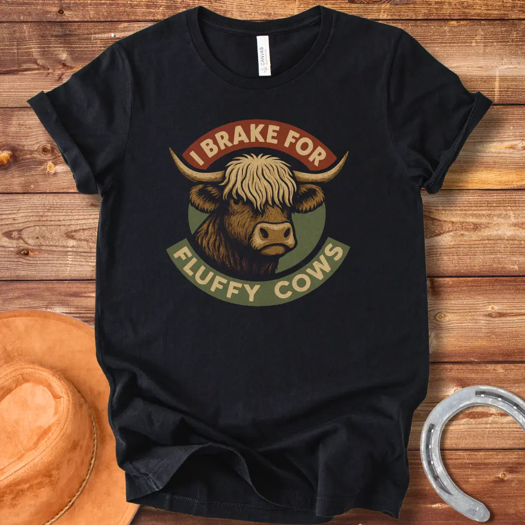 Illustration of a Highland cow's head with the text 'I Brake For Fluffy Cows'