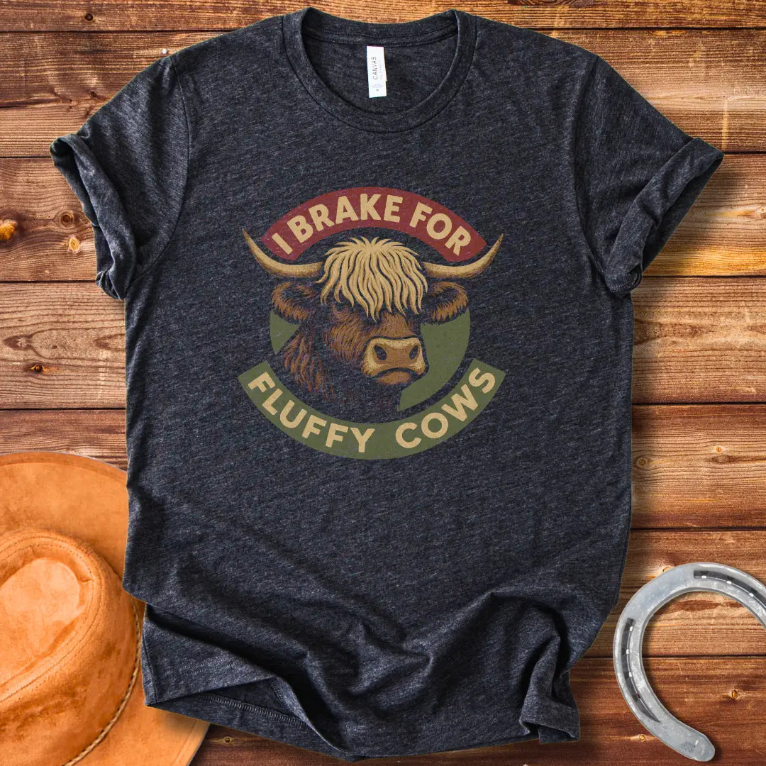 Illustration of a Highland cow's head with the text 'I Brake For Fluffy Cows'